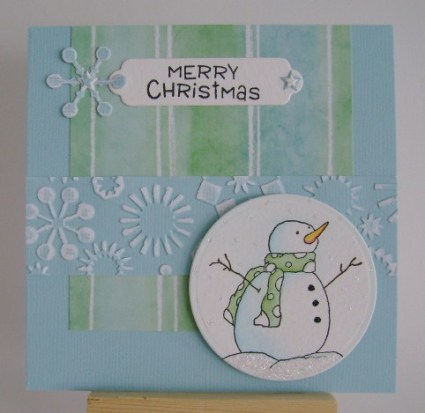 DTGD Snowman snowman with green scarf on blue and green papers