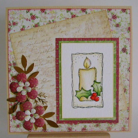 candle christmas candle with holly and berries