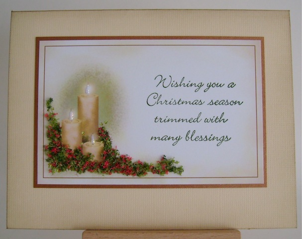 flowersoftcandle three christmas candles surrounded by greenery