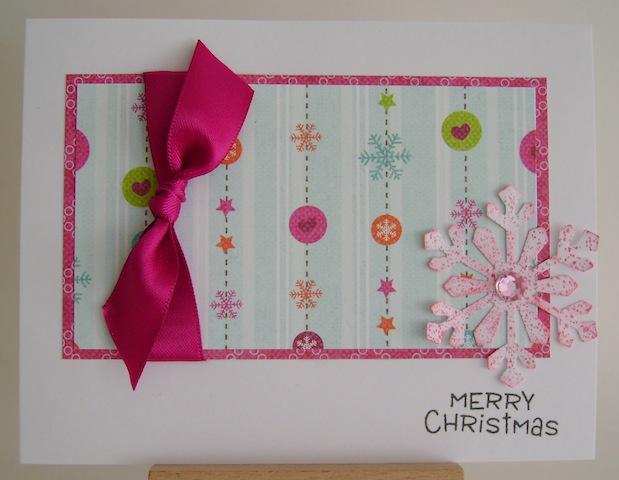 pink bow with pink snowflake christmas card