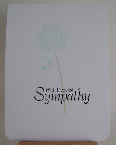 blue dandelion with black sympathy sentiment