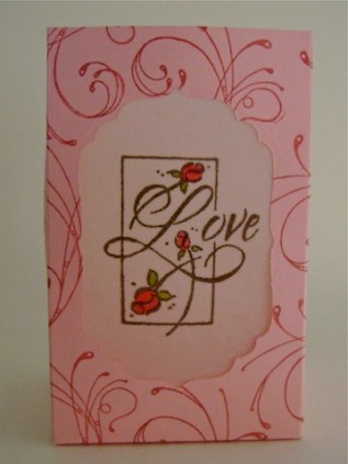 luminary with love sentiment and red rose