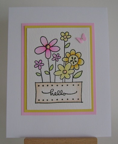 QFTD51 pink, orange and yellow flowers in a pot with hello sentiment