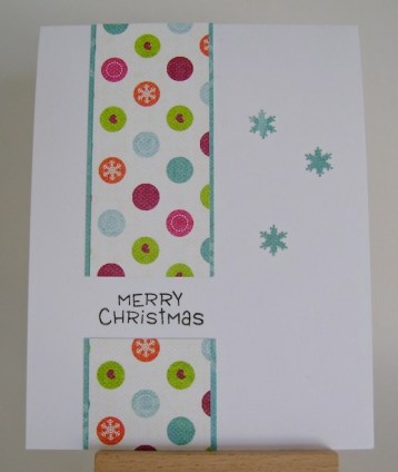 circles and snowflakes christmas card in bright orange, turquoise and pink