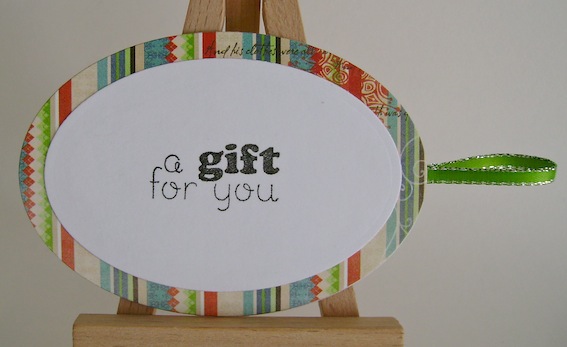 back of snowman gift tag with a gift for you sentiment