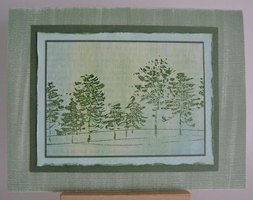 inspiredtrees green card with blue frame and row of green trees