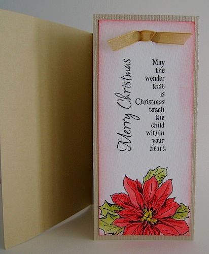 inside of christmas card with poinsettia and detachable bookmark 