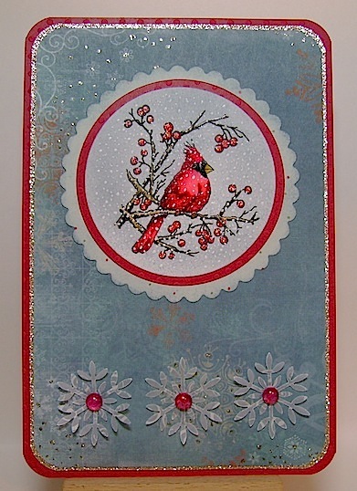 BBBDEC2011 blue greeting card featuring red cardinal in tree branches and snowflakes