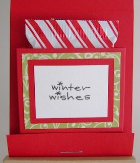 inside of red and green matchbook candy holders with a ghirardelli square