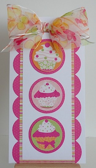 bdaycupcakes card in pink, yellow and orange with cupcakes and ribbon