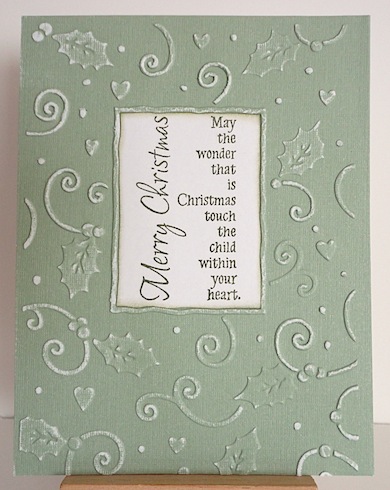 july2012 christmas card in green and white in embossed swirl and holly pattern