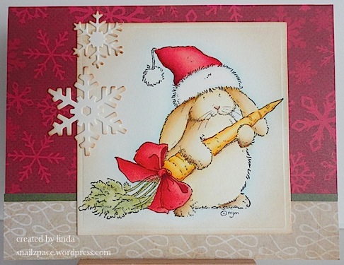 christmas card with bunny and carrot in red, green and beige