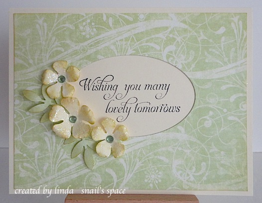 card in green with flowers and wishing you many lovely tomorrows sentiment