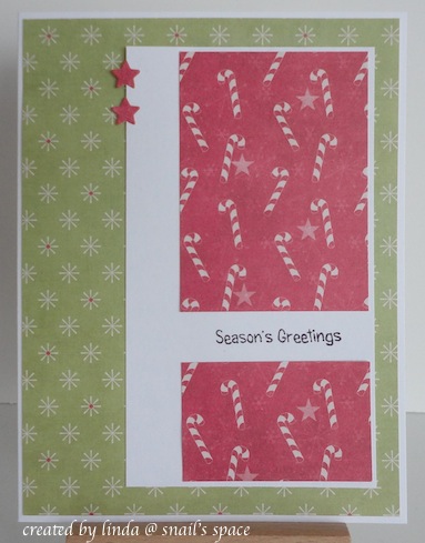 christmas card in red and green with candy canes, stars and season's greetings sentiment
